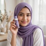 Bangladeshi woman in lavender hijab holding I'm From Black Rice Toner 30ml
